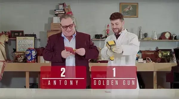 Antony Charman and Matthew Christlow with writing that says Antony 2 Golden Gun 1