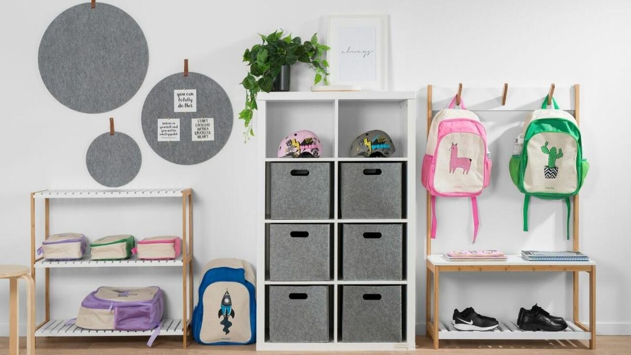 children's schoolbags and books organised